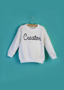 White Creator kids sweater made of organic cotton with dark blue artwork