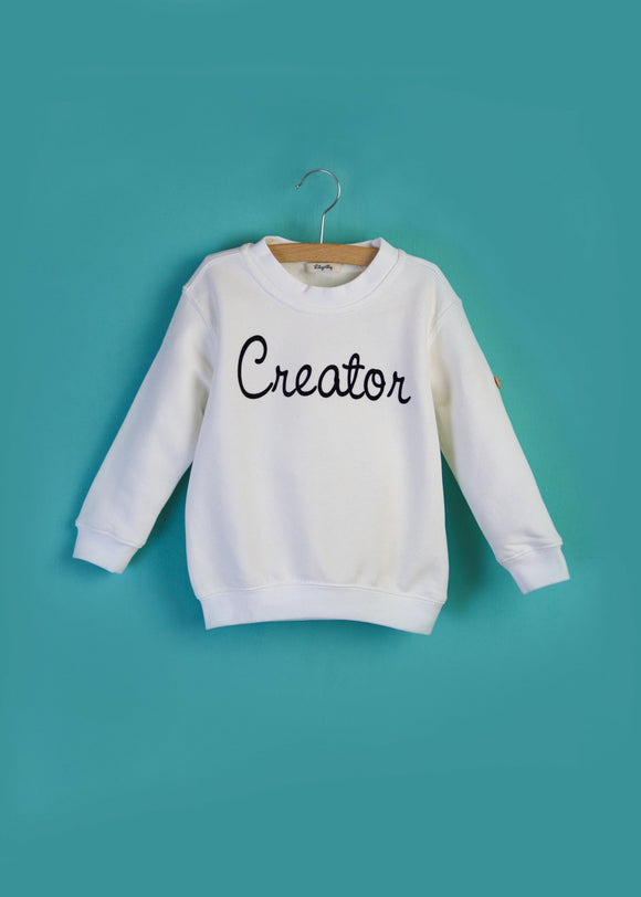 White Creator kids sweater made of organic cotton with dark blue artwork